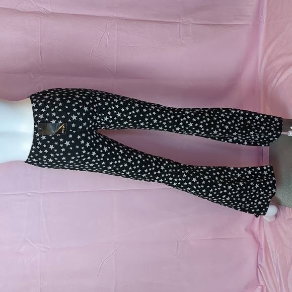 Nasty Gal Star Print Flared Pull On Trousers in Black size 4 - Picture 2 of 5